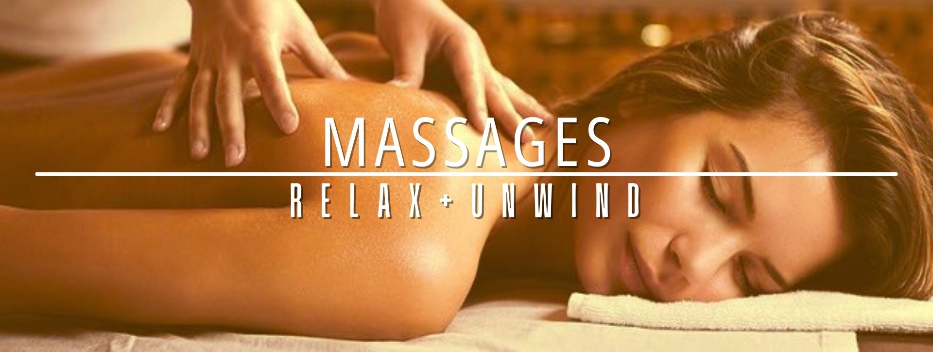 woman having a body massage promoting relaxation + unwind