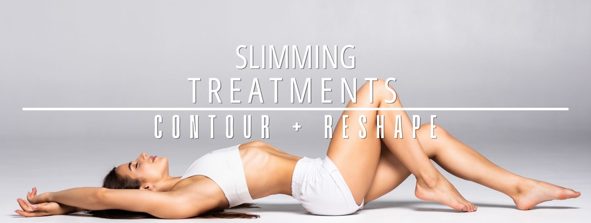 woman showing her perfect body as a result of slimming treatments promoting contour + reshape