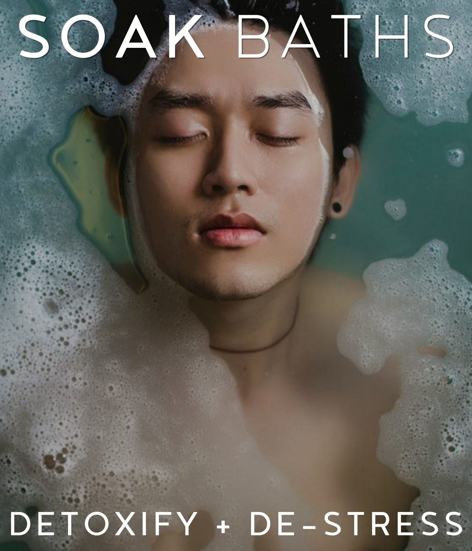man in a bathtub having soak baths promoting detoxify + destress