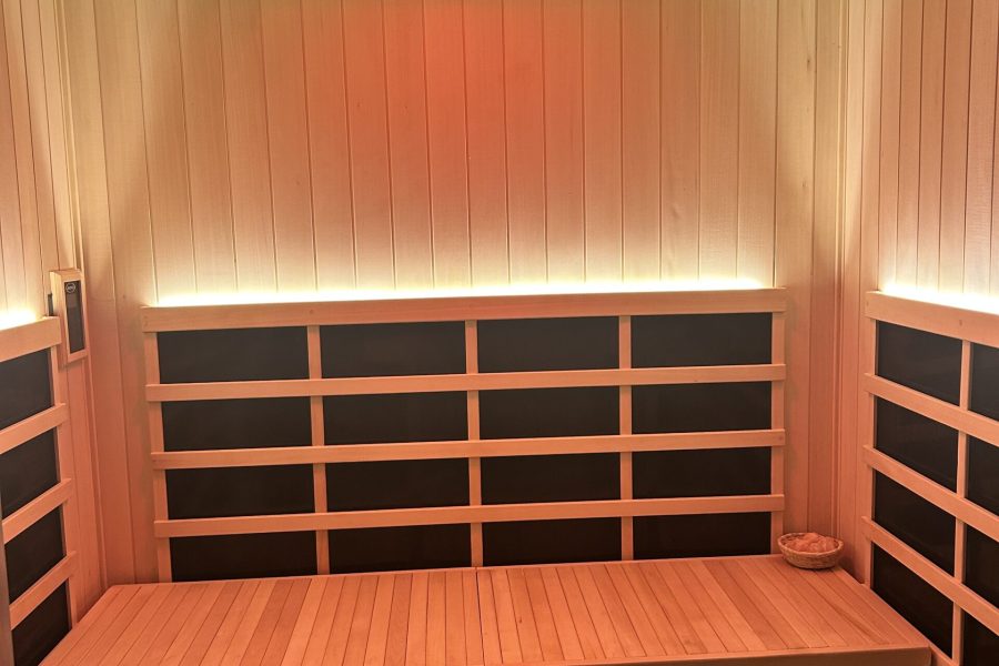 Wood-lined sauna at DE SUAR Santa Cruz Spa inside Courtyard by Marriott